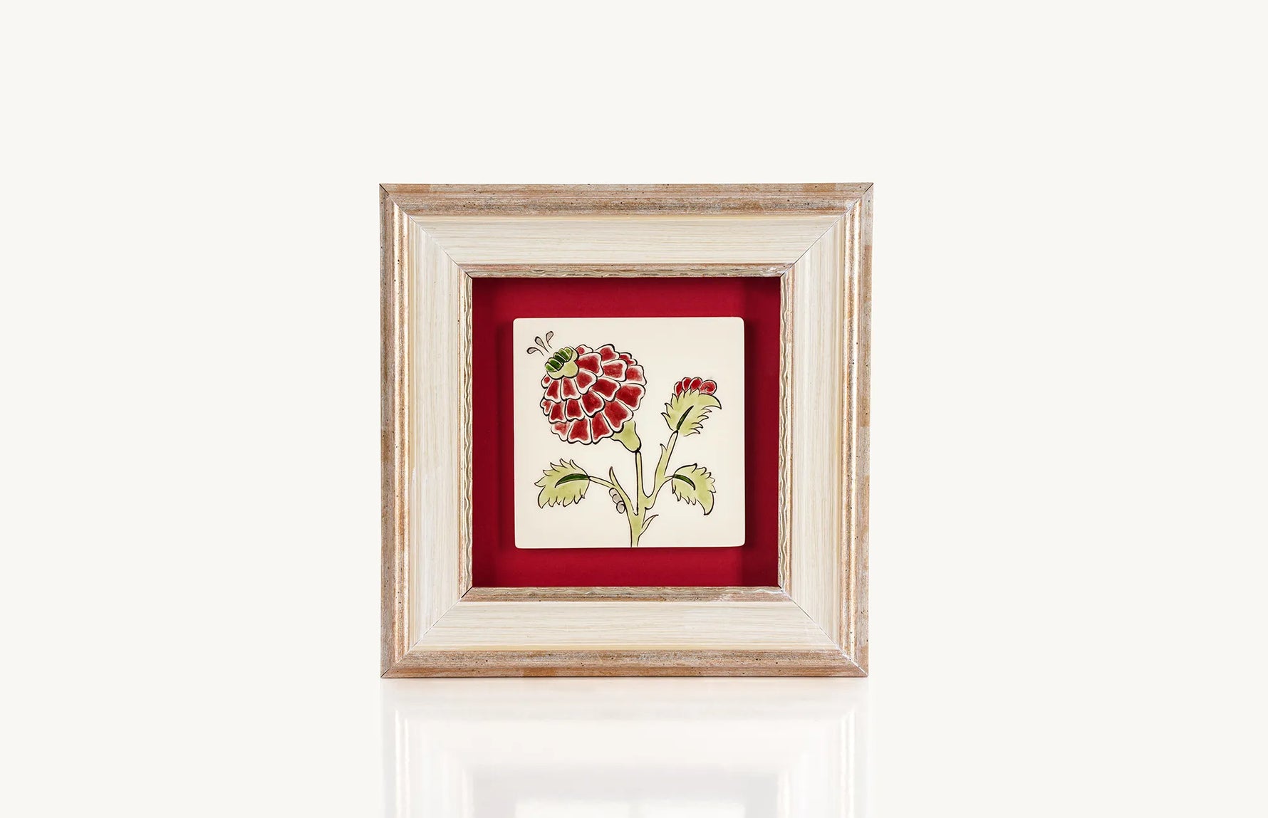 Red rose painted on a small decorative wall hanging