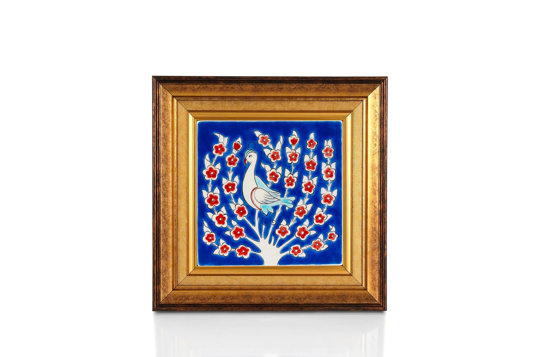 Bold blue ground flat tile with Tree of Life pattern painted