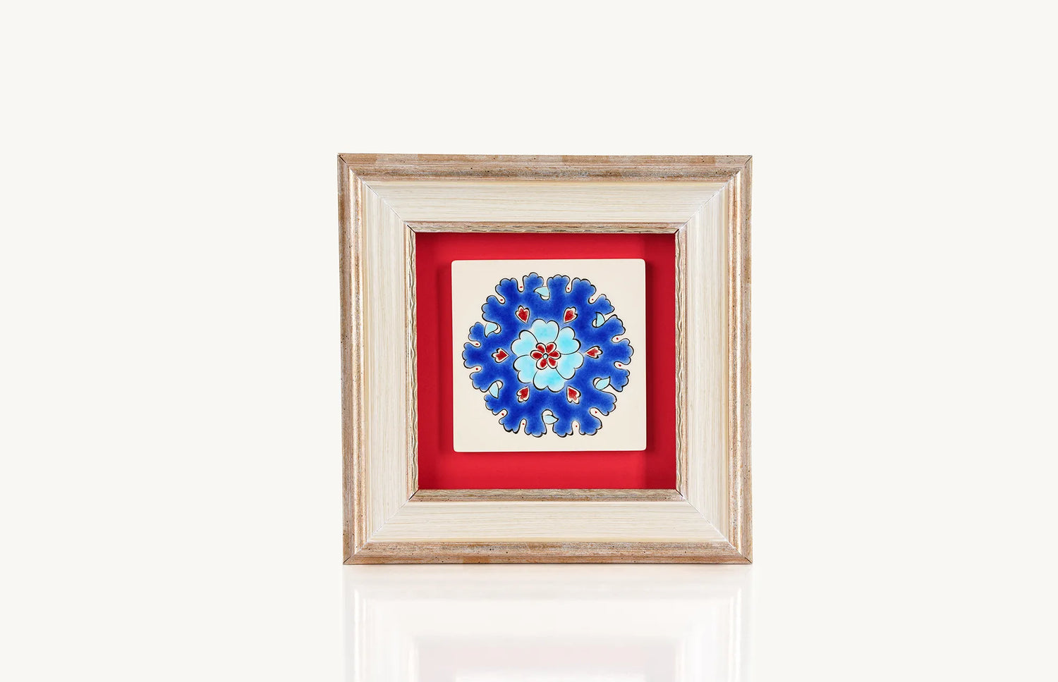 Pench petal motifs in Ottoman blue, turquoise and red accent framed with wooden frame ceramic tile.