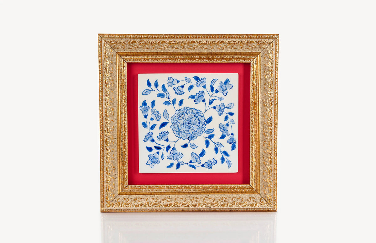 Blue and white wall decor ceramic square tile in a frame