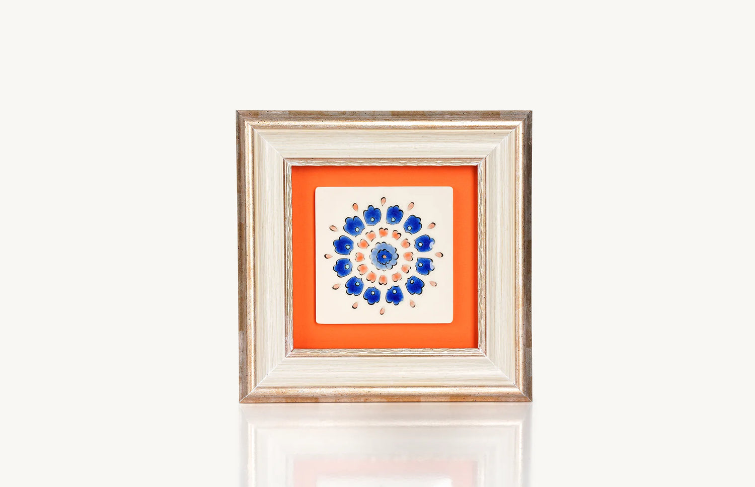 Styles flower in blue, mounted in orange background framed tile