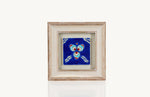 Three circles painted on framed ceramic wall decor item