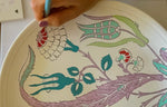 Tulips, roses and rosebud painted on ceramic plate