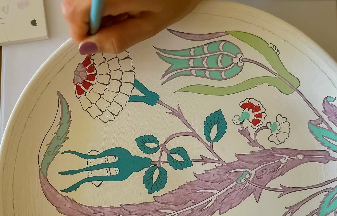 Tulips, roses and rosebud painted on ceramic plate
