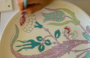 Tulips, roses and rosebud painted on ceramic plate